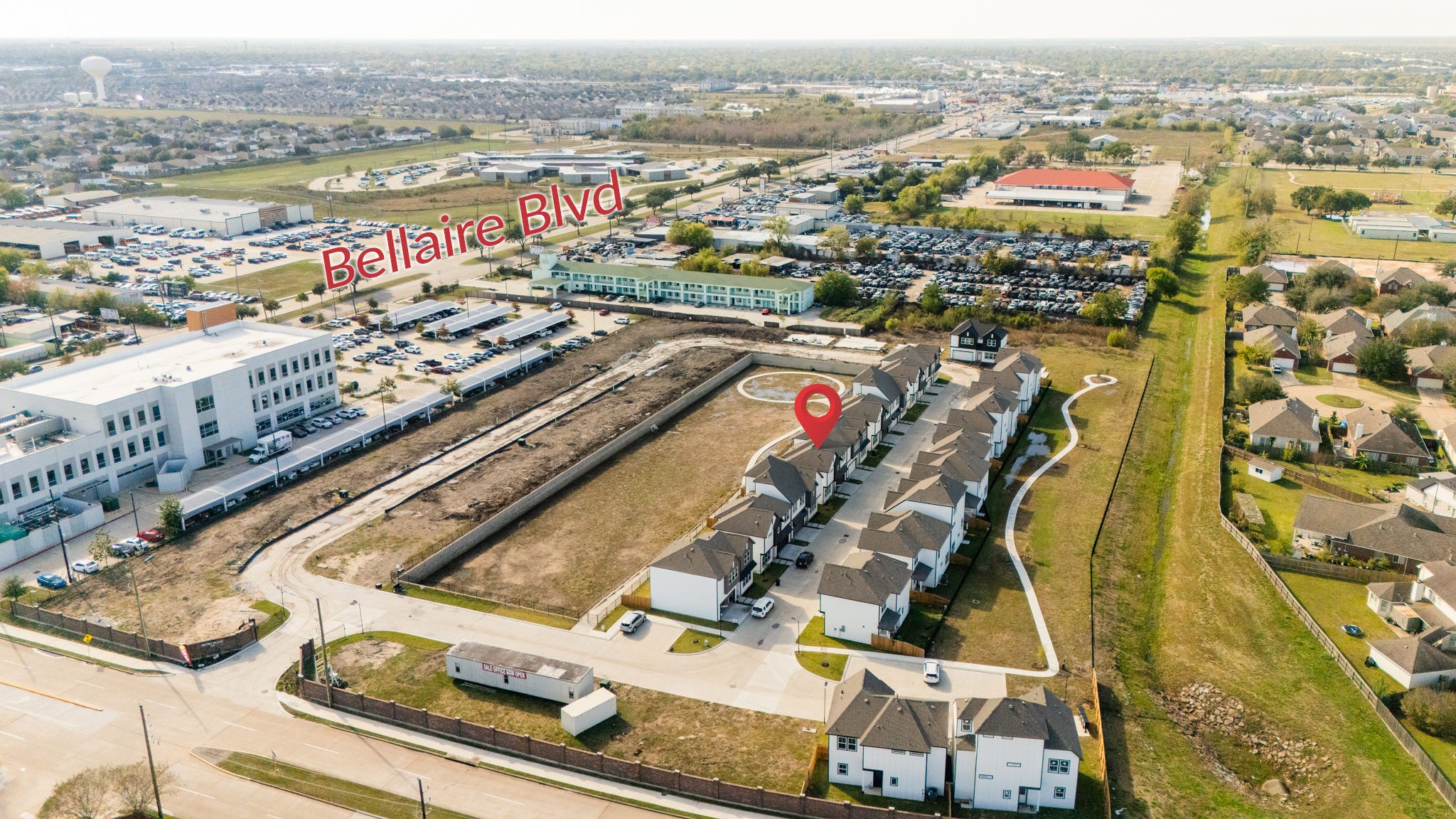 6702 Metro Boulevard, Unit 12 Houston, TX 77083 - Photo 39 of 48 an aerial view of residential houses with outdoor space