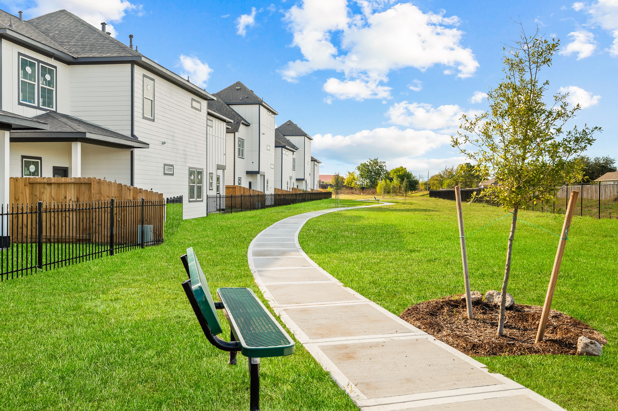 6702 Metro Boulevard, Unit 12 Houston, TX 77083 - Photo 46 of 48 a view of a backyard with sitting area
