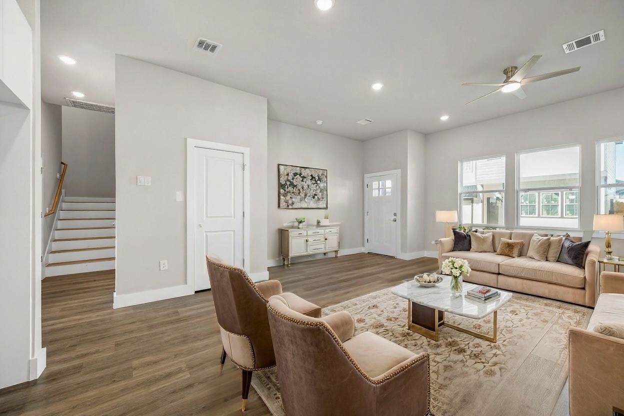 6702 Metro Boulevard, Unit 12 Houston, TX 77083 - Photo 10 of 48 a living room with furniture and wooden floor