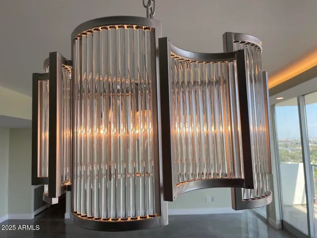 a bathroom with a shower and a glass door