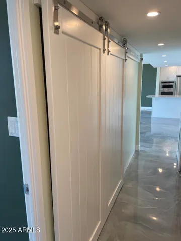 a view of an empty room with a window