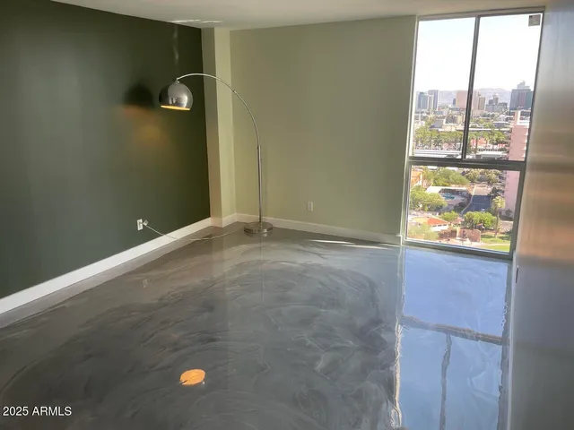 a view of a swimming pool with a lounge chairs