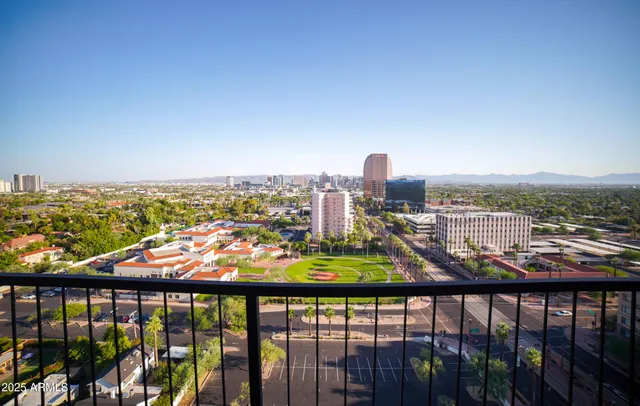 a kitchen with a sink stainless steel appliances and cabinets
