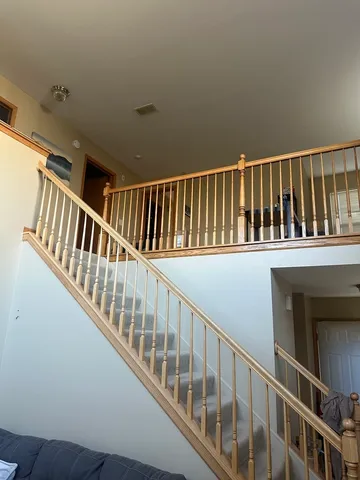 a view of balcony with wooden floor