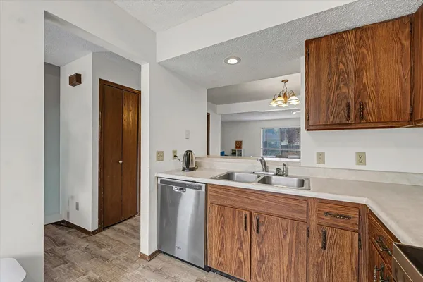 a kitchen with a sink and cabinets