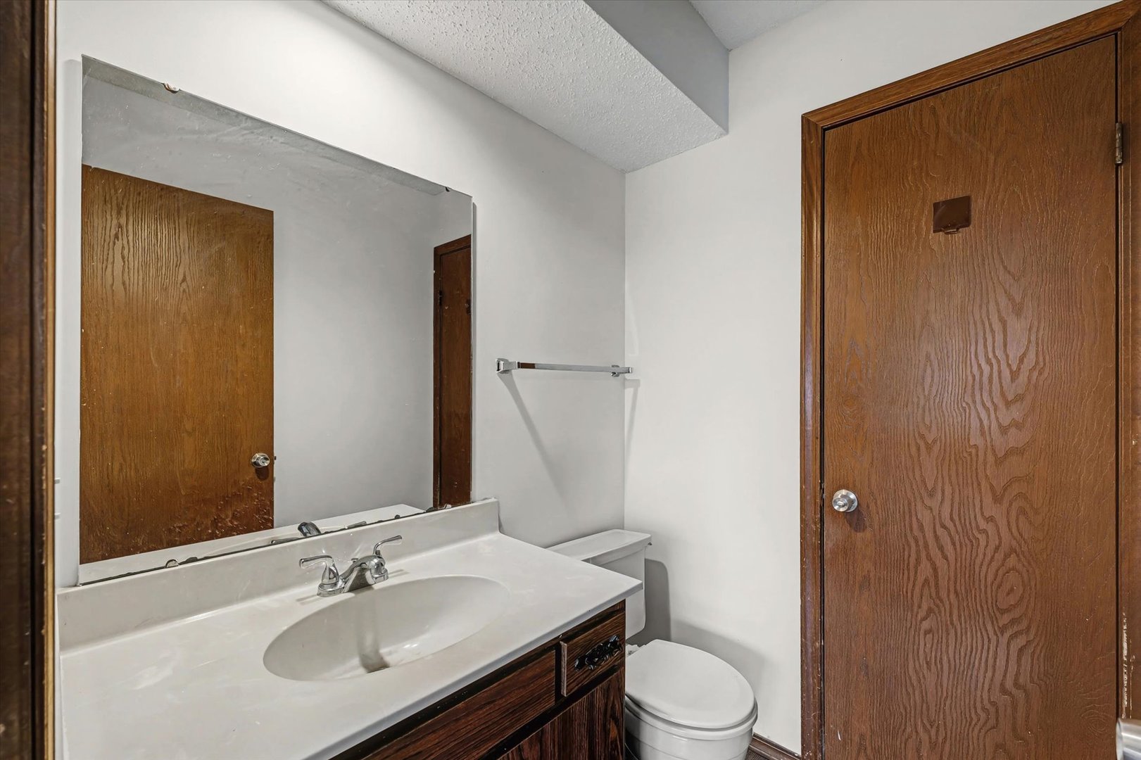 2111 Sunview Drive, Unit 2111 Champaign, IL 61821 - Photo 19 of 28 a bathroom with a sink a toilet and shower