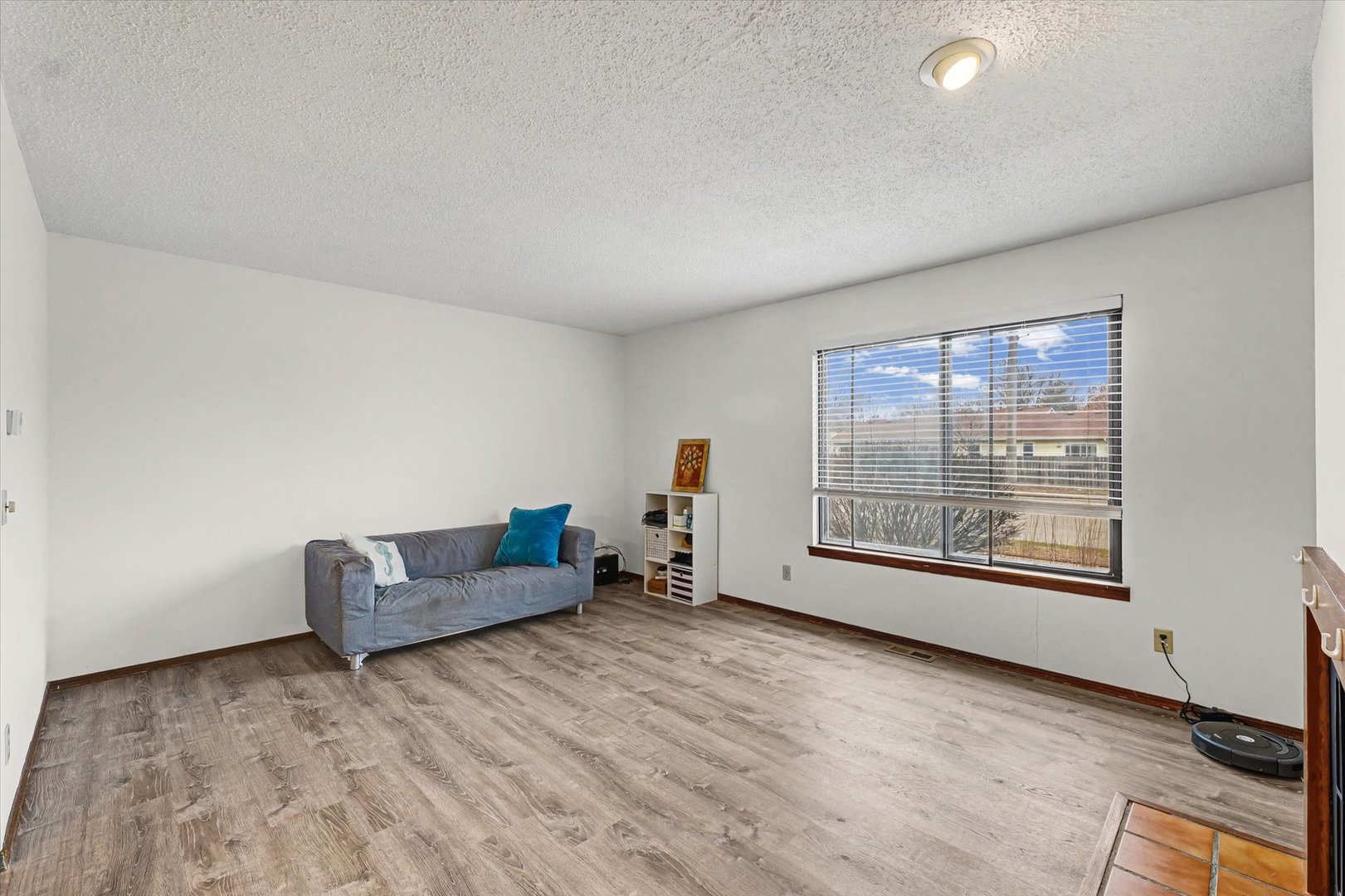 2111 Sunview Drive, Unit 2111 Champaign, IL 61821 - Photo 5 of 28 a living room with furniture and a floor to ceiling window