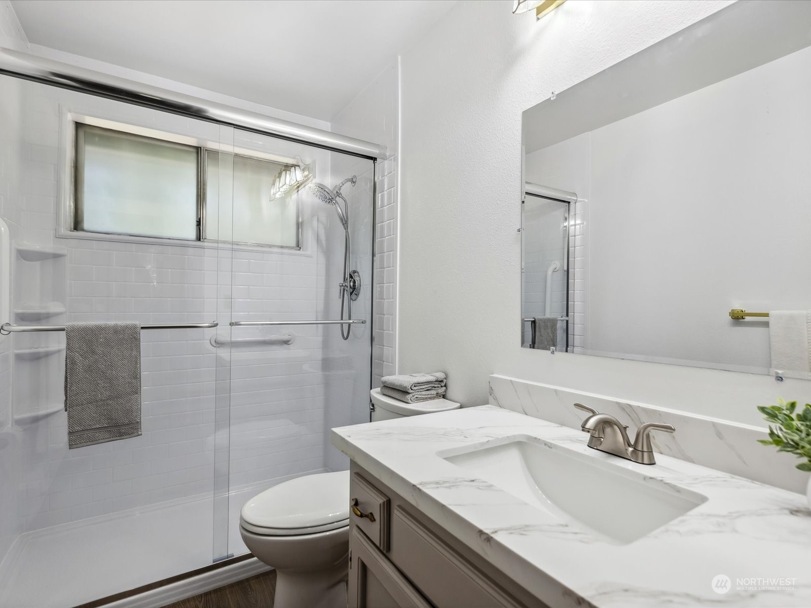 4330 200th Street Southeast Bothell, WA 98012 - Photo 18 of 36 a bathroom with a granite countertop sink toilet and shower