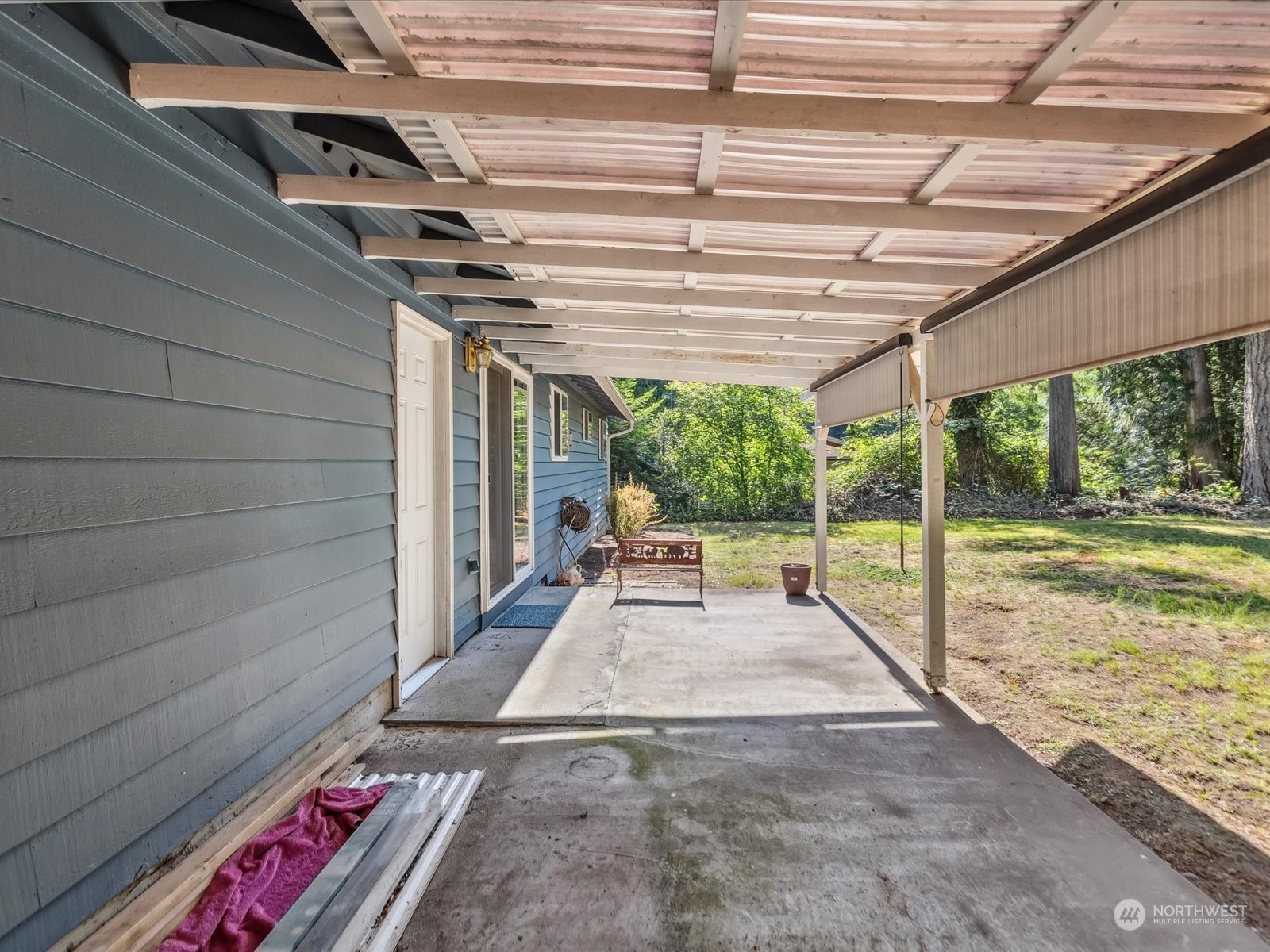 4330 200th Street Southeast Bothell, WA 98012 - Photo 20 of 36 a view of a backyard with a patio