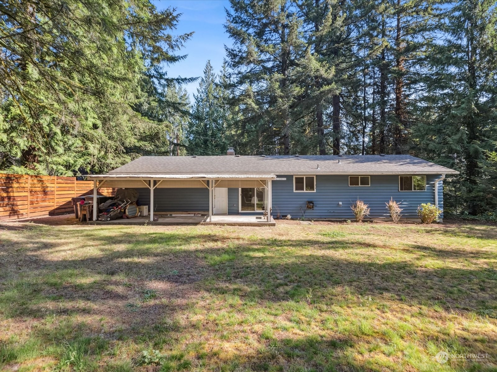 4330 200th Street Southeast Bothell, WA 98012 - Photo 21 of 36 a front view of a house with a garden