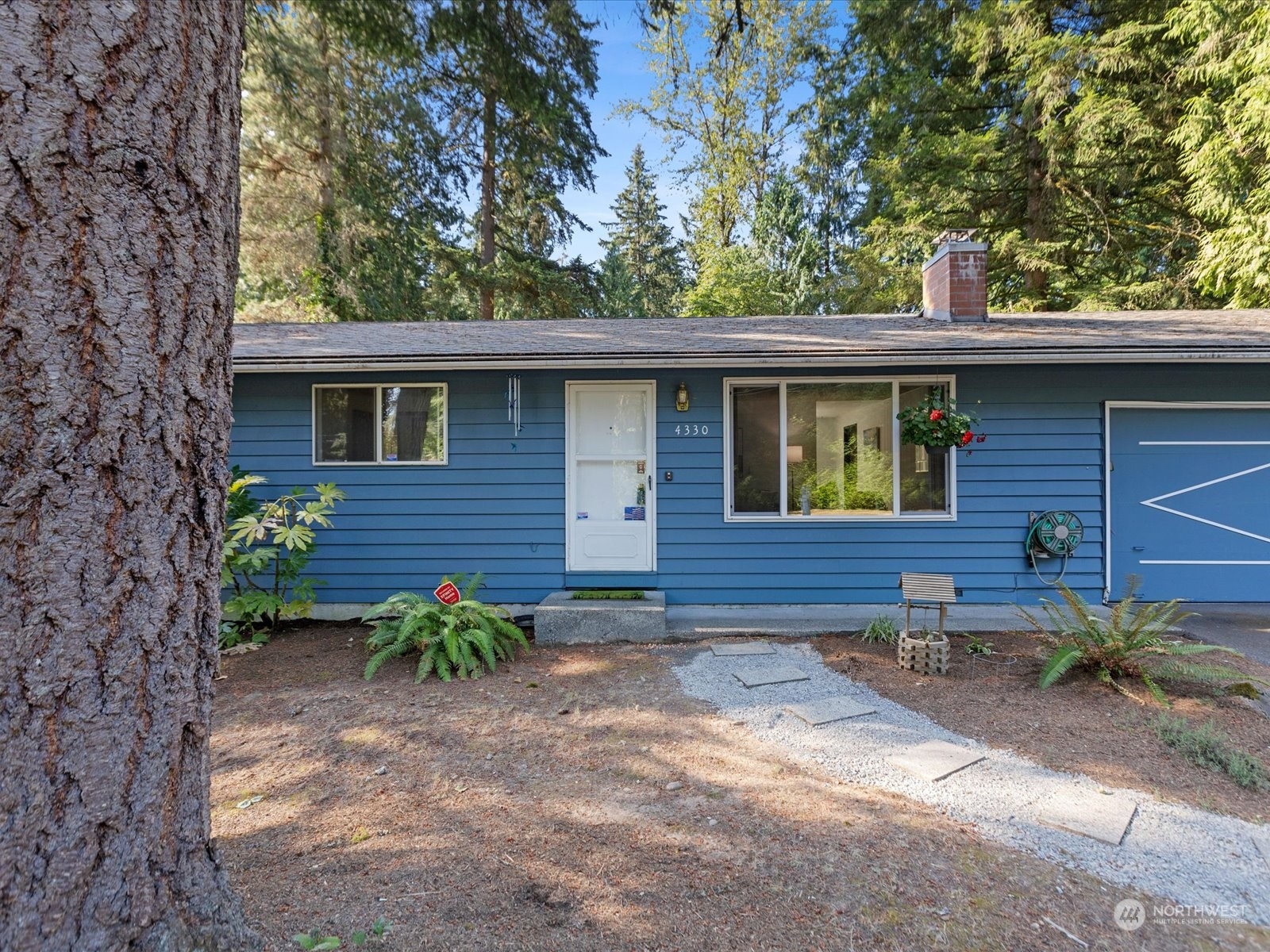 4330 200th Street Southeast Bothell, WA 98012 - Photo 4 of 36 a view of a house with a yard
