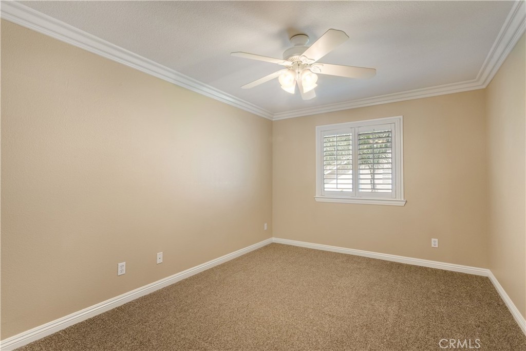 33351 Nicholas Common Temecula, CA 92592 - Photo 24 of 42 an empty room with windows and fan