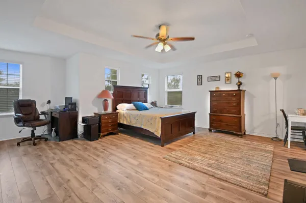 a bedroom with a bed and furniture