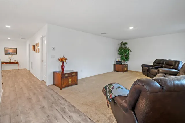 a bedroom with furniture and a bed