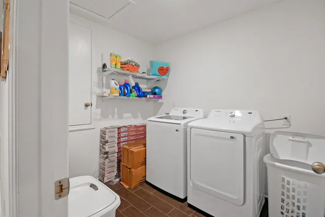 a utility room with dryer and washer