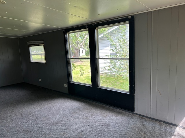 116 North English Street Braidwood, IL 60408 - Photo 4 of 8 a view of an empty room with a window