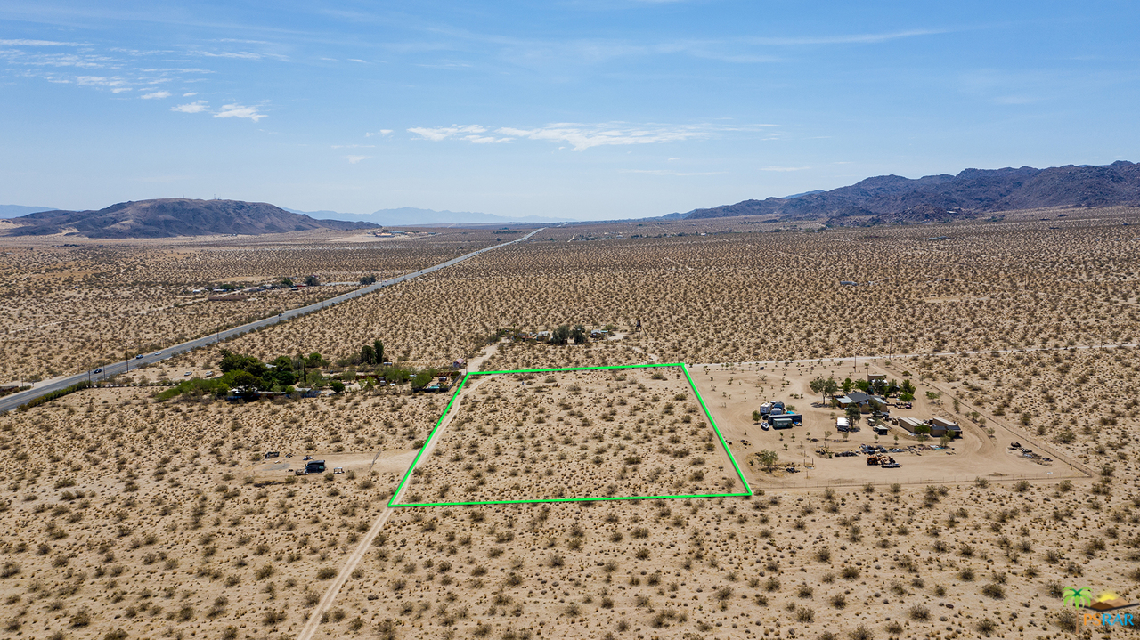 6556 Sunkist Road Joshua Tree, CA 92252 - Photo 5 of 17 a view of lake with mountain in the background