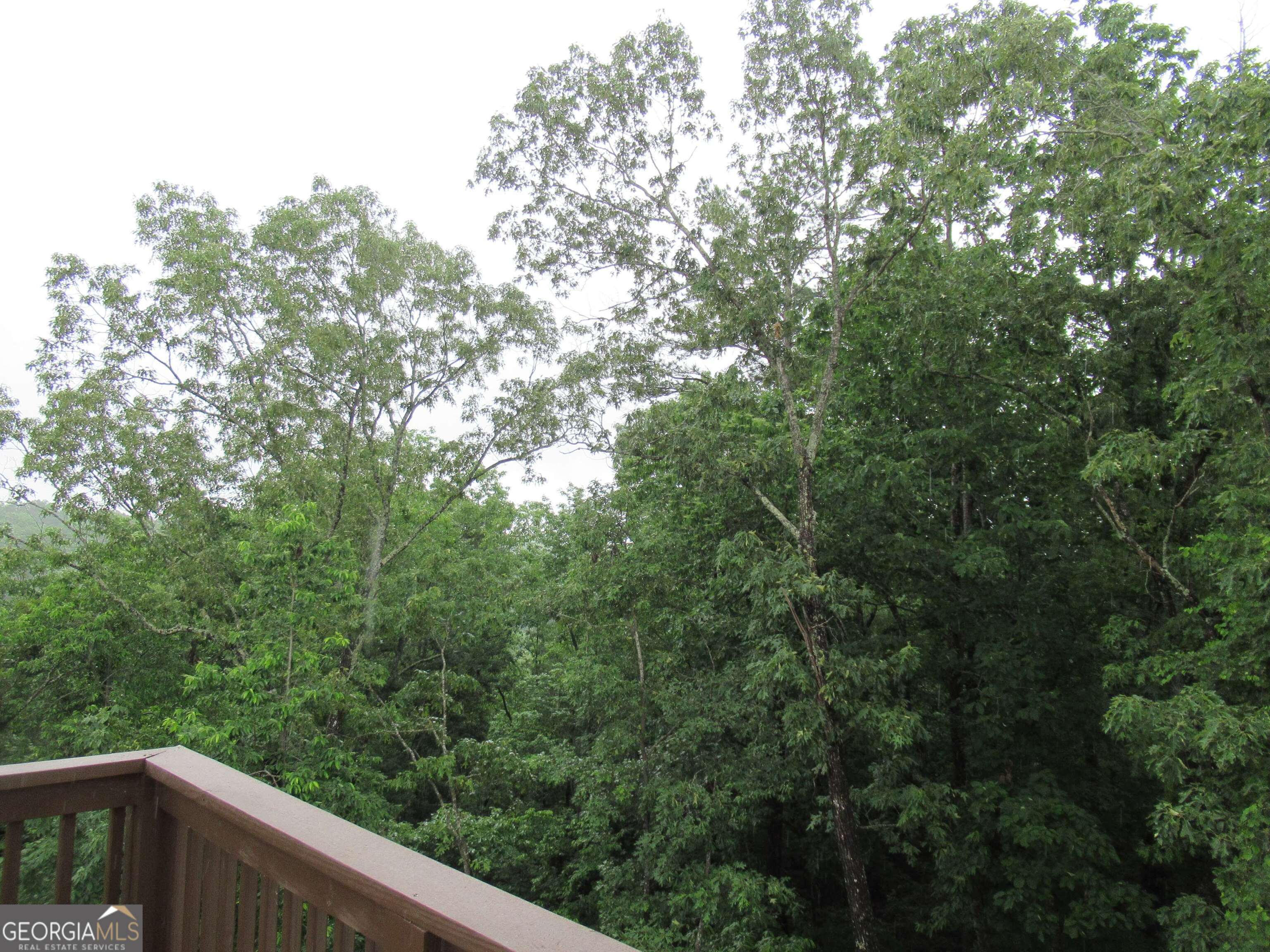 765 Old Kerns Road Dawsonville, GA 30534 - Photo 22 of 36 a balcony with an outdoor space