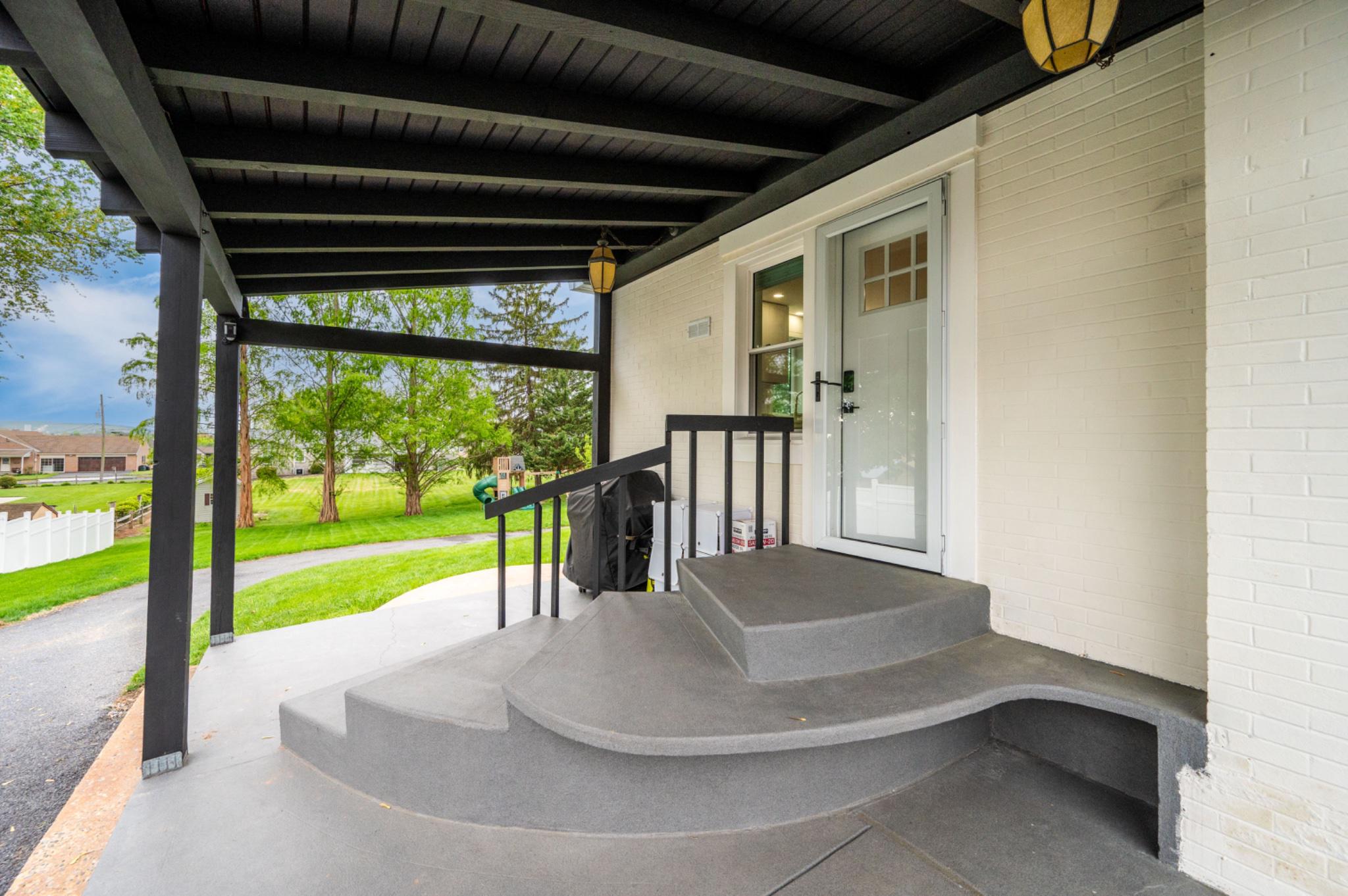 520 Elm Street Denver, PA 17517 - Photo 30 of 39 Inviting side porch.