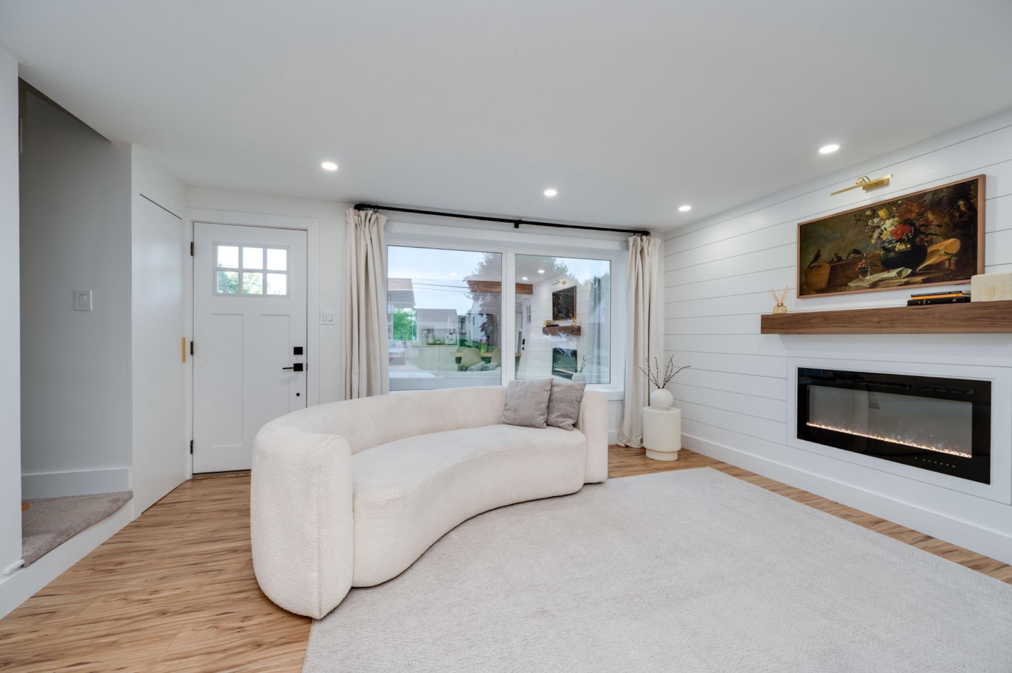 520 Elm Street Denver, PA 17517 - Photo 3 of 39 Bright living room with fireplace.