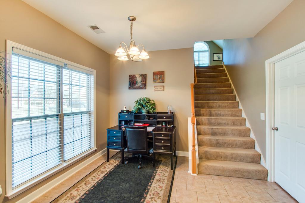 403 Reagan Road Mount Juliet, TN 37122 - Photo 12 of 30 a view of a workspace with furniture and a window