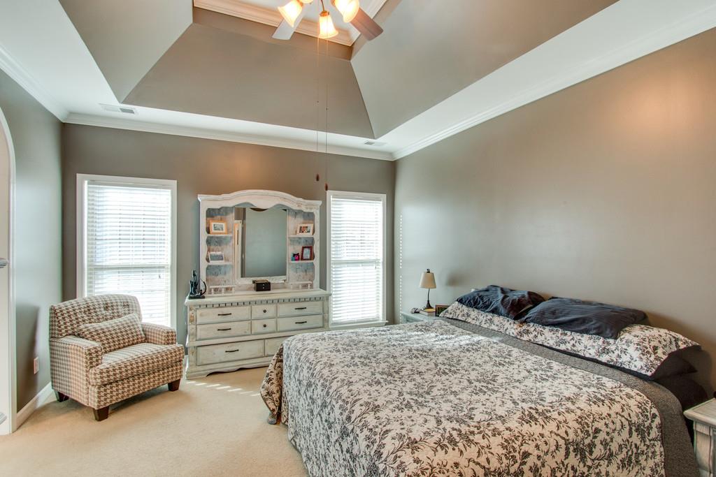 403 Reagan Road Mount Juliet, TN 37122 - Photo 16 of 30 a bedroom with a bed and a couch