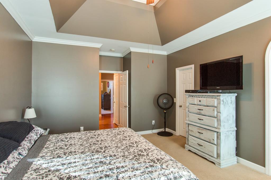 403 Reagan Road Mount Juliet, TN 37122 - Photo 17 of 30 a bedroom with a bed and furniture