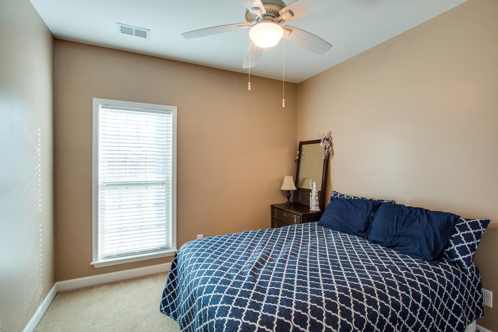 403 Reagan Road Mount Juliet, TN 37122 - Photo 19 of 30 a bedroom with a bed and window