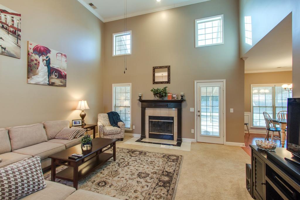 403 Reagan Road Mount Juliet, TN 37122 - Photo 5 of 30 a living room with furniture and a fireplace