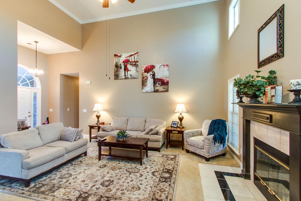 403 Reagan Road Mount Juliet, TN 37122 - Photo 6 of 30 a living room with furniture and a fireplace
