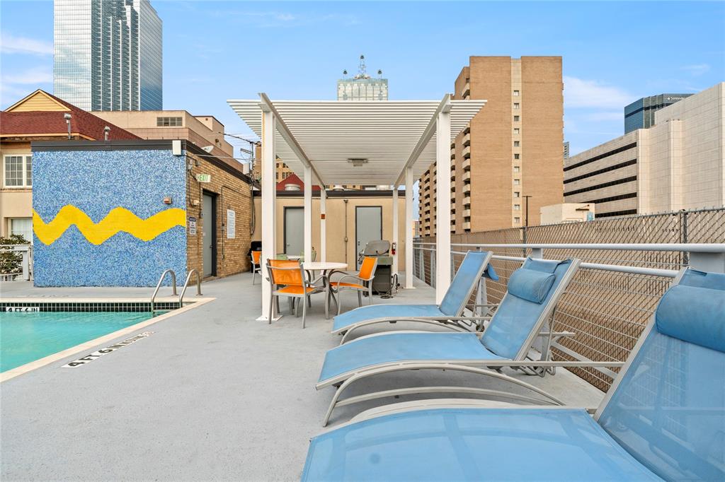 1122 Jackson Street, Unit 811 Dallas, TX 75202 - Photo 23 of 28 swimming pool view with a seating space