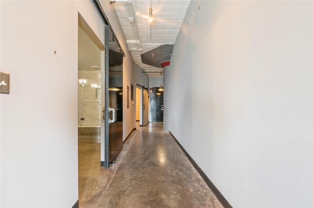 1122 Jackson Street, Unit 811 Dallas, TX 75202 - Photo 5 of 28 a view of hallway with stairs