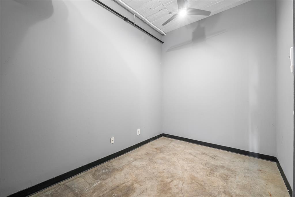 1122 Jackson Street, Unit 811 Dallas, TX 75202 - Photo 9 of 28 a view of an empty room