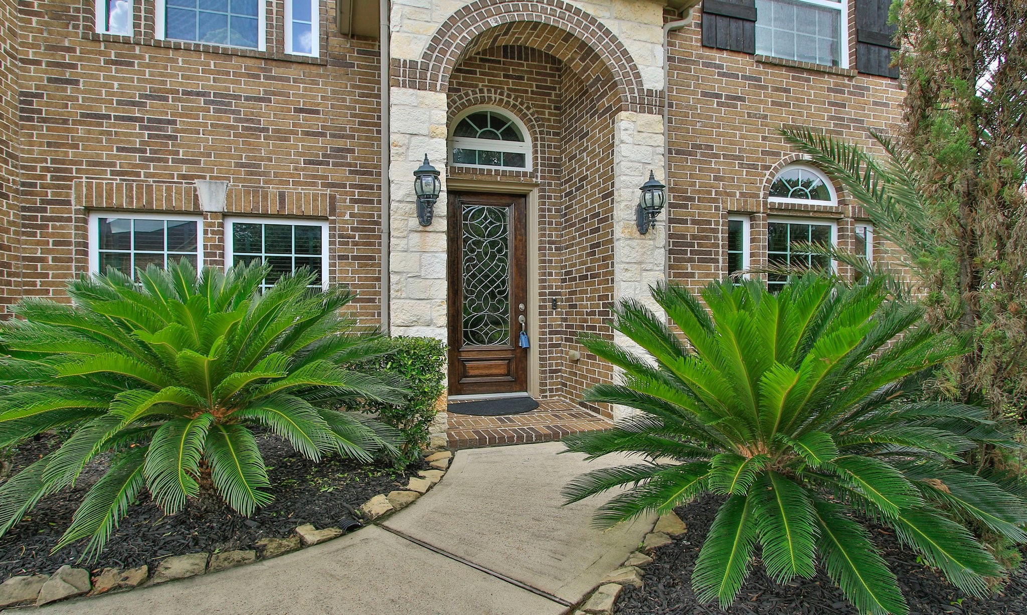 19818 Iceland Court Spring, TX 77379 - Photo 3 of 35 a front view of a house with garden