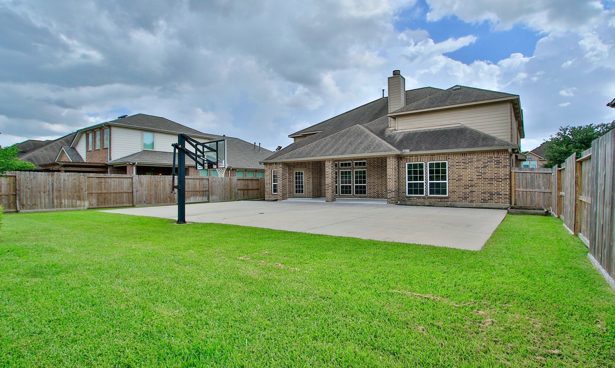 19818 Iceland Court Spring, TX 77379 - Photo 33 of 35 a front view of a house with a yard