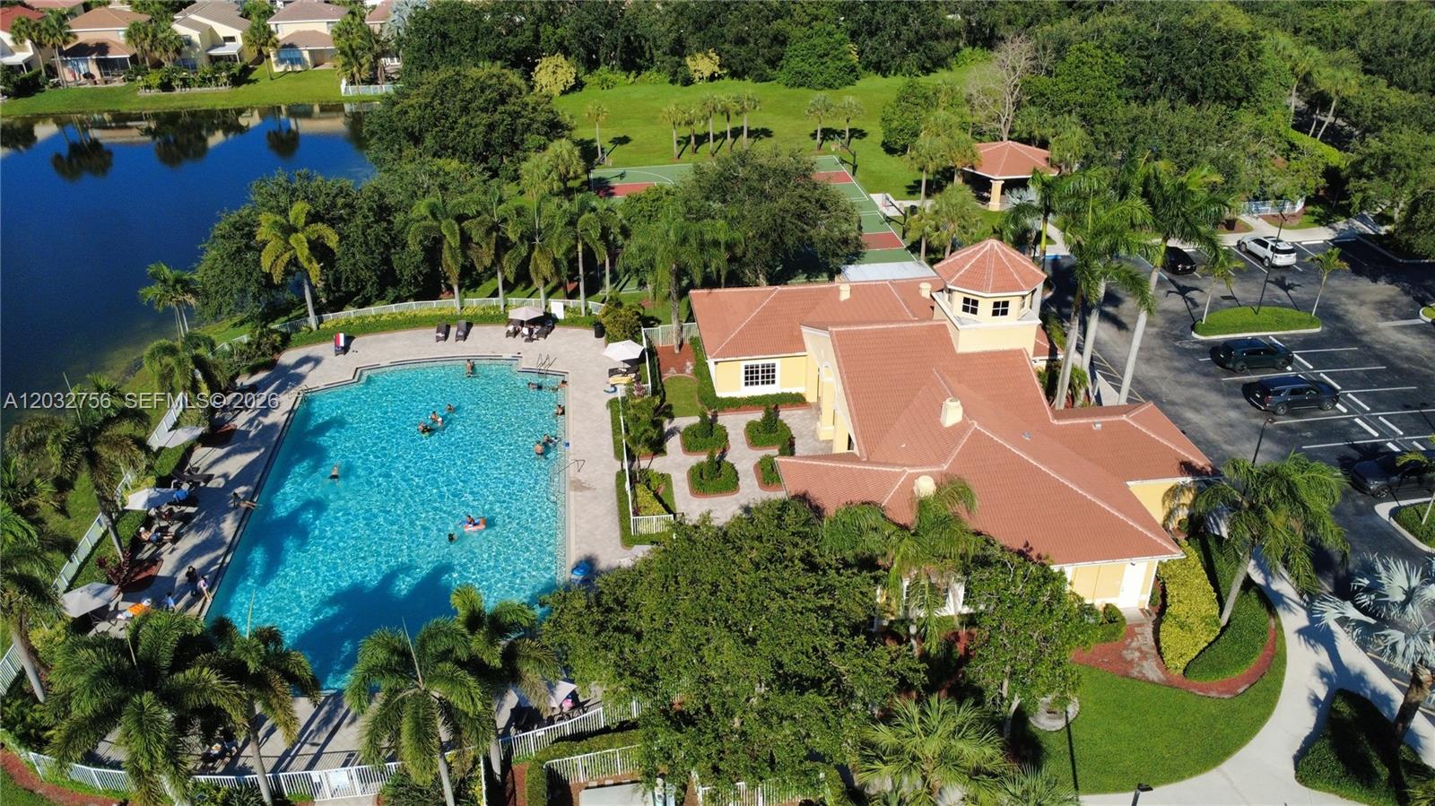 4331 Southwest 124th Way Miramar, FL 33027 - Photo 35 of 40 an aerial view of a house with a yard and lake view