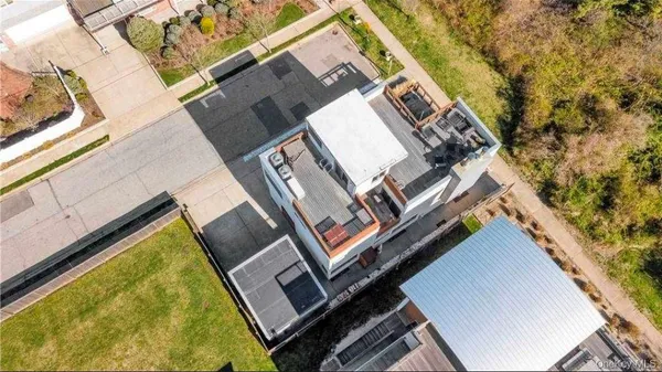 a view of roof deck with seating space