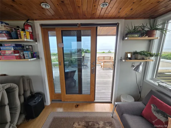 a view of a terrace with seating space