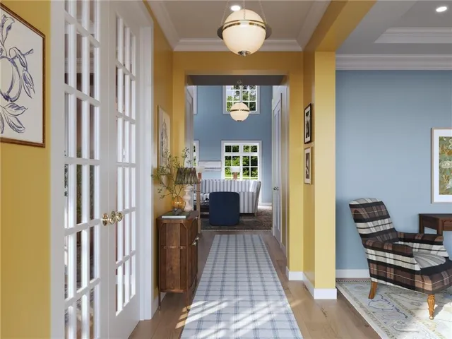 a view of a hallway with front door