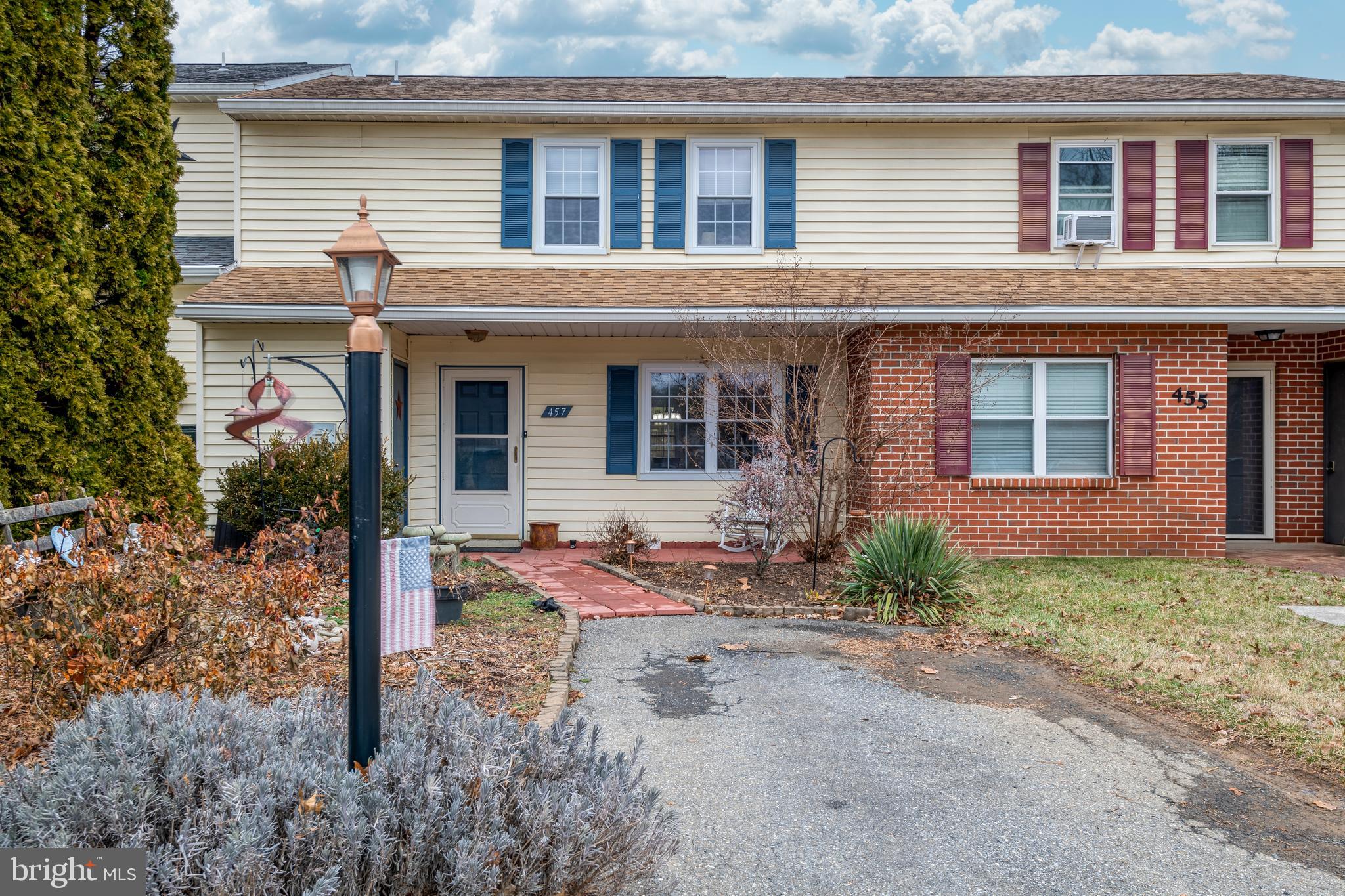 457 Crosswinds Drive Lititz, PA 17543 - Photo 1 of 27 a front view of a house with garden