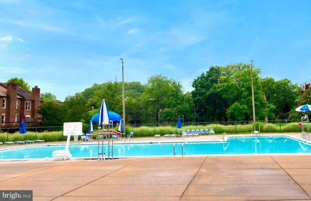 a view of a park with houses