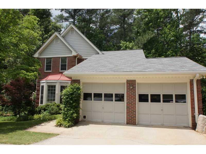 3925 Clayhill Clarkston, GA 30021 - Photo 1 of 1 Exterior Front. Great curb appeal and cul-de-sac lot. Note 2 car garage and beautiful foliage in the background