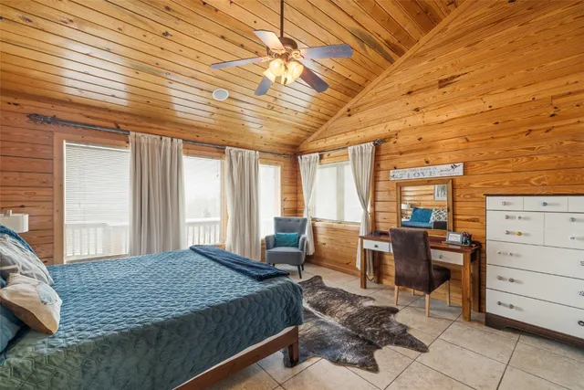 a bed room with a bed and furniture