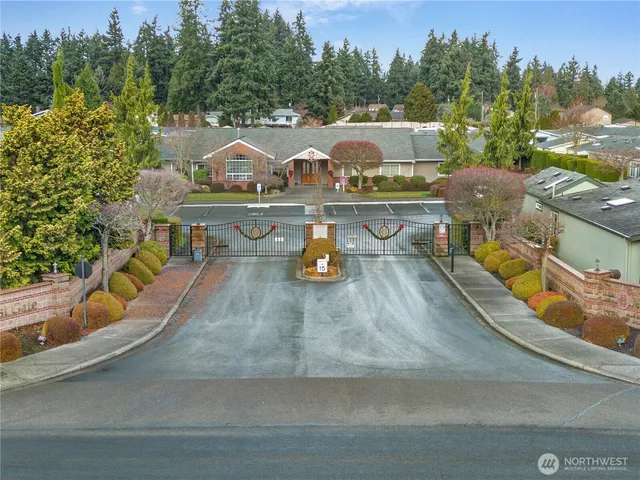 an aerial view of a house with outdoor space