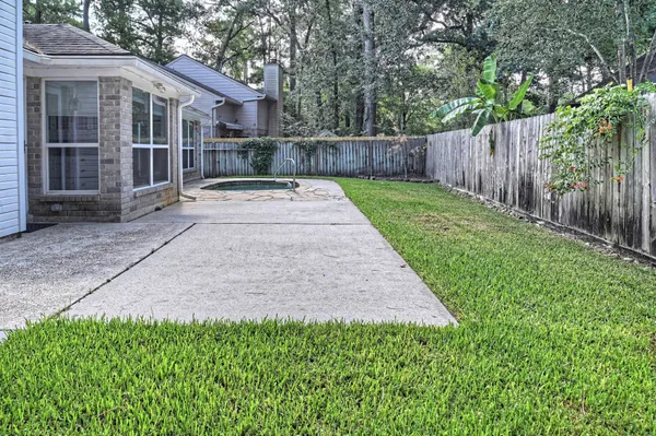 $450,000 | 15 White Bark Place, The Woodlands, TX 77381