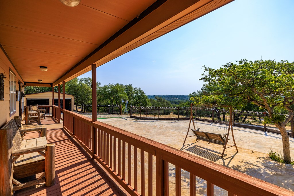 3417 Kc 443 Harper, TX 78631 - Photo 34 of 65 a view of a balcony with chairs