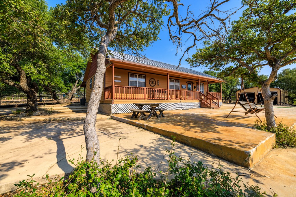 3417 Kc 443 Harper, TX 78631 - Photo 4 of 65 a view of a house with snow on the road