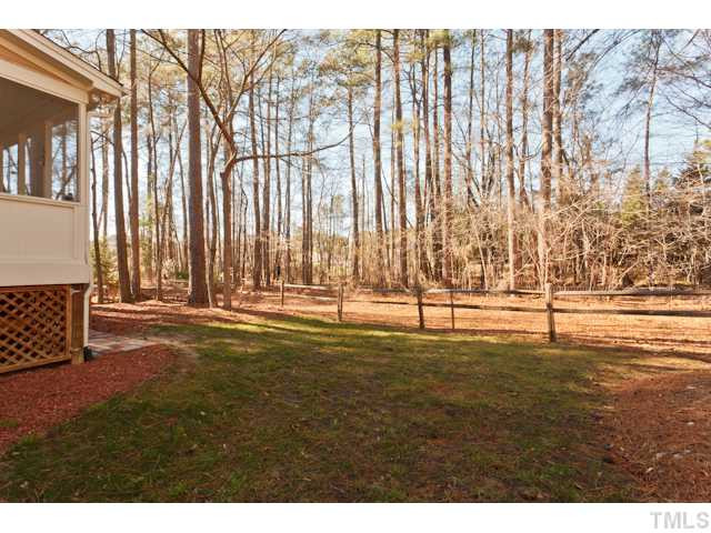 12508 Tappersfield Court Raleigh, NC 27613 - Photo 20 of 25 unbelievable Private Back Yard with Fence & Natural Wooded Buffer. Plenty of room for play! Exterior Back