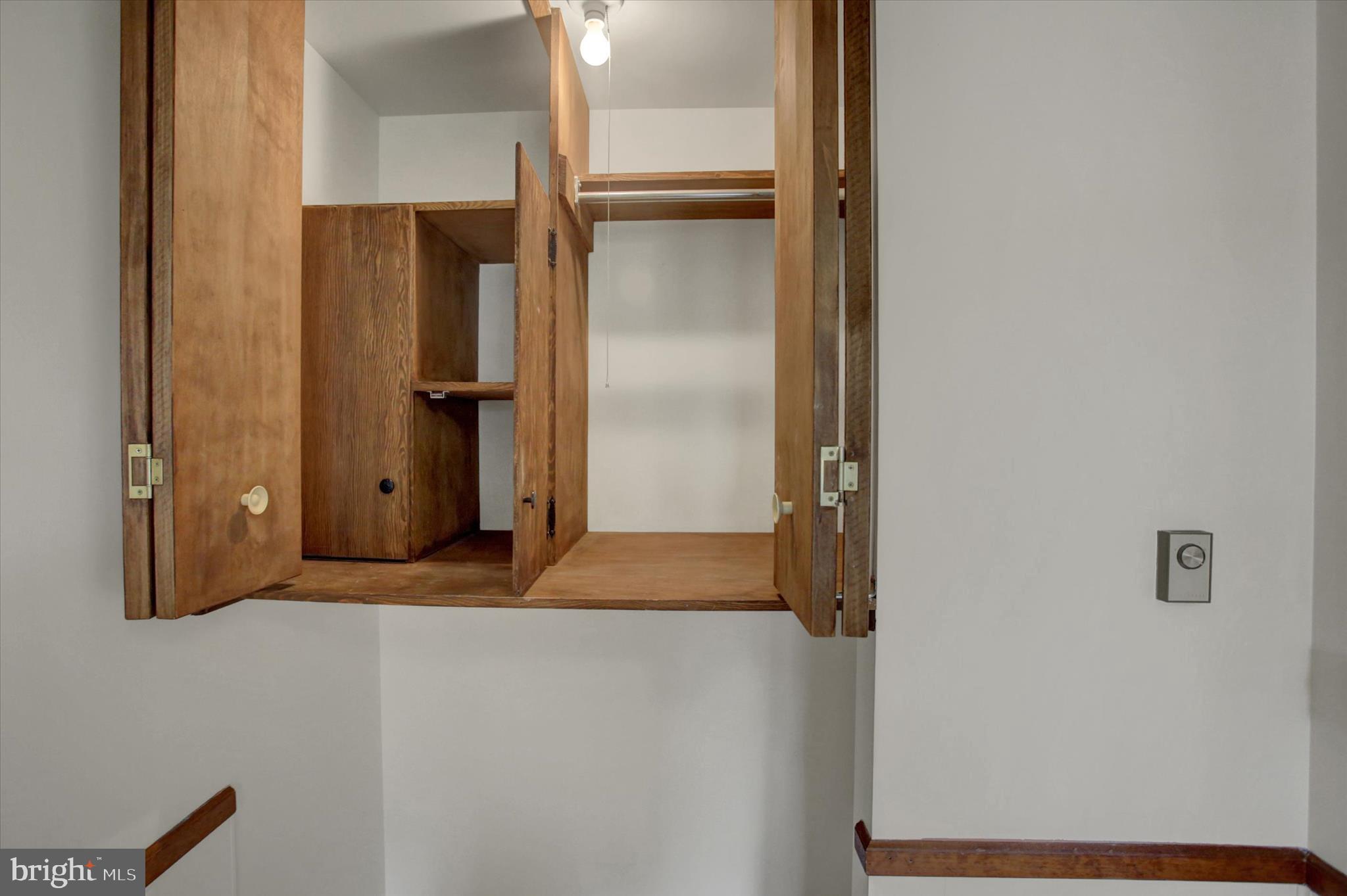 18514 Indian Cottage Road Hagerstown, MD 21742 - Photo 18 of 56 a view of walk in closet with empty room