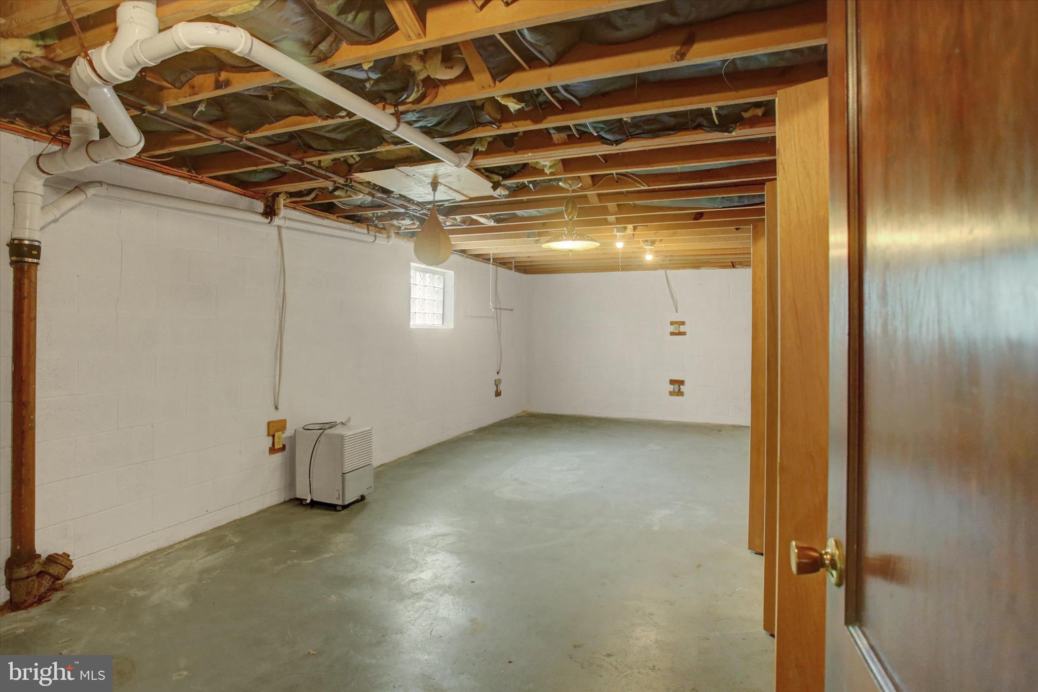 18514 Indian Cottage Road Hagerstown, MD 21742 - Photo 42 of 56 a view of a room with racks on the wall